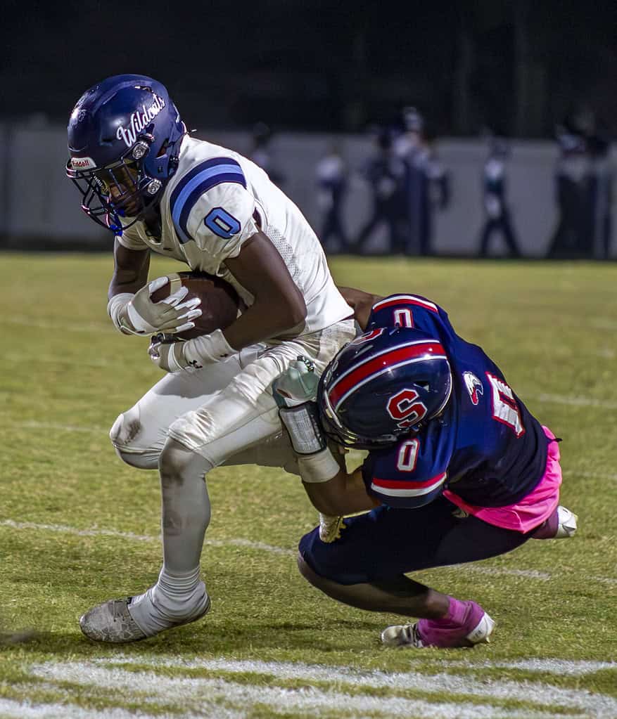 Springstead's Chadiell Echavarria tackles Wildcat's Sincere Allen.(Photo by Hanna Maglio)