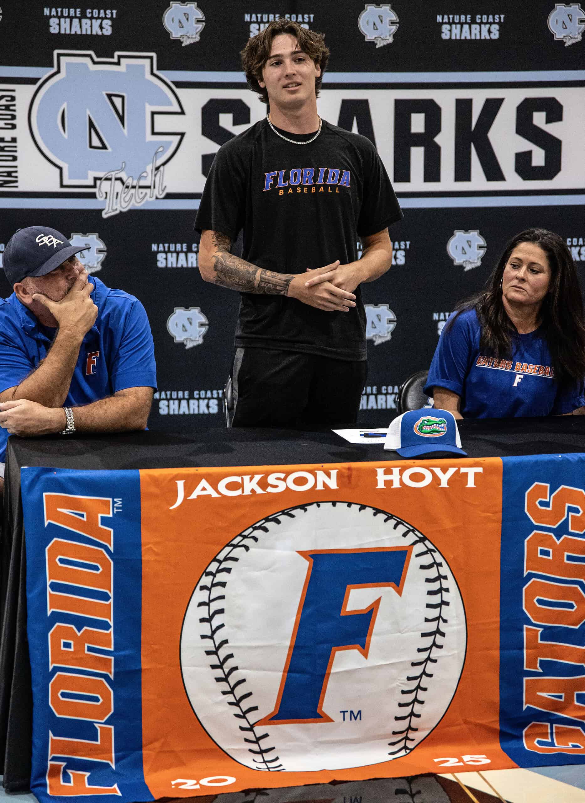 Left to right: Father Rich Hoyt, Jackson Hoyt and Mother Kelly Hoyt. [Photo by Austen Aupperlee]