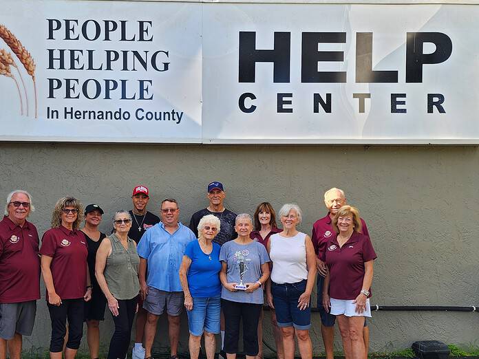 The Brooksville Elks Lodge #2582 and staff from People Helping People. [Photo courtesy of Doranda Hinton, Secretary]