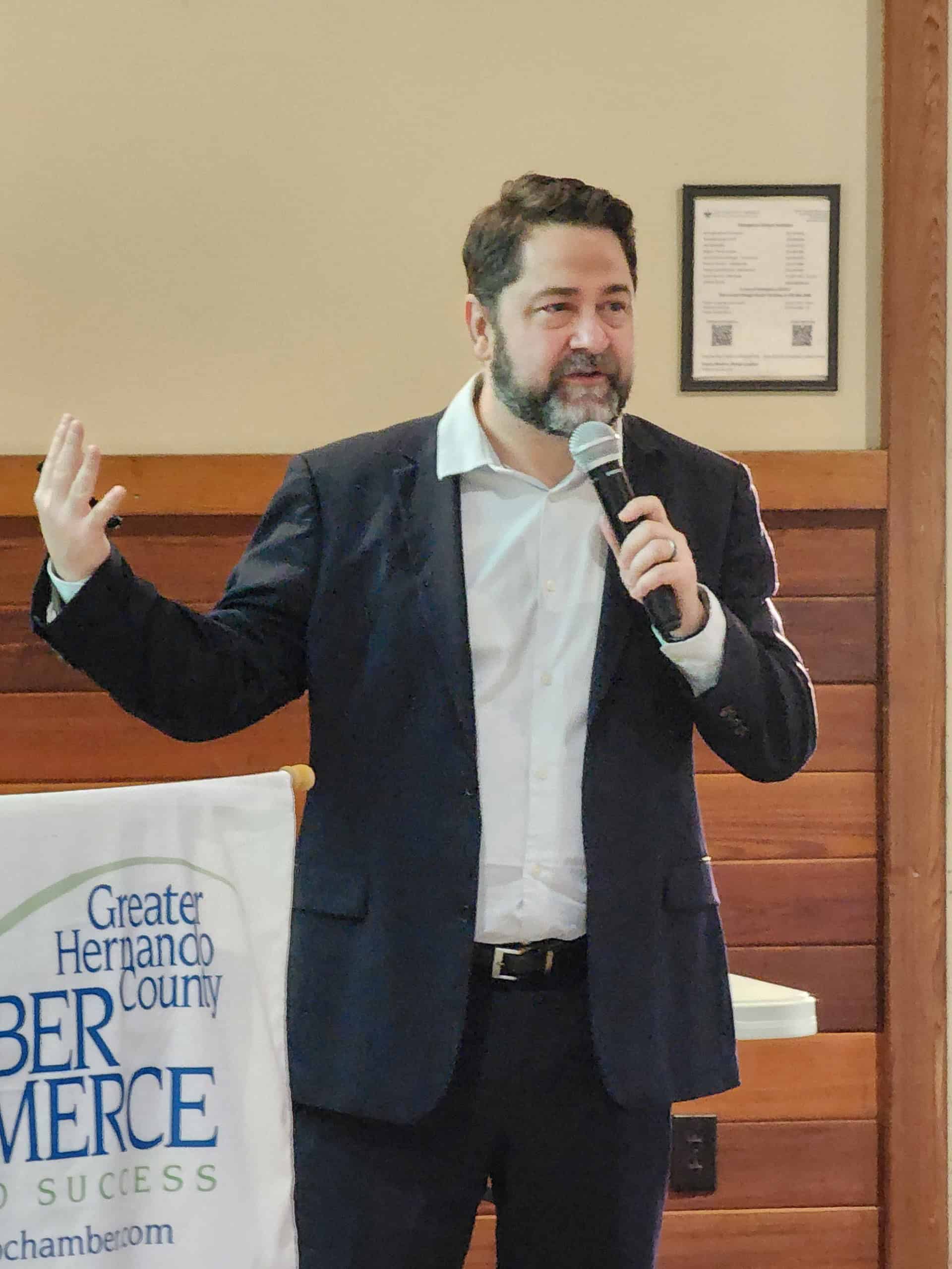 Dr. Brad O'Connor speaks to Hernando County's Chamber of Commerce at their monthly breakfast meeting on Wednesday. [Credit: Austyn Szempruch]