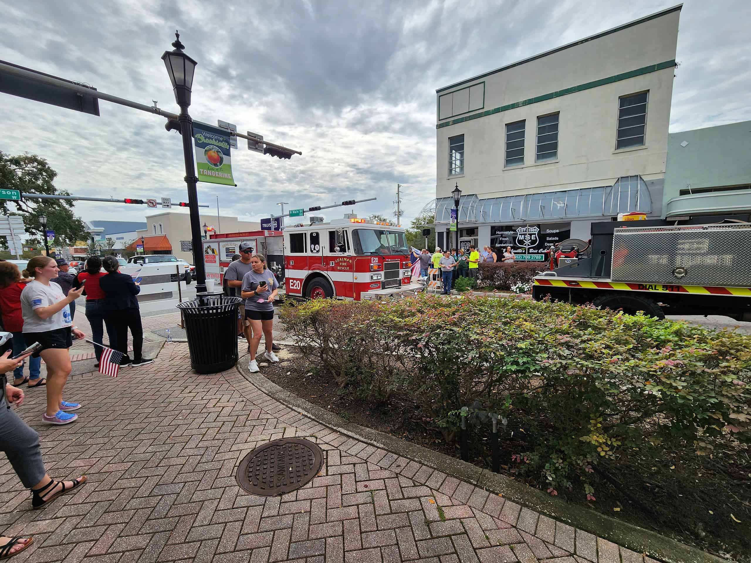 Citizens cheered and greeted the 9/11 Never Forget Exhibit as it rolled down Main Street on Thursday. [Photo by Austyn Szempruch]