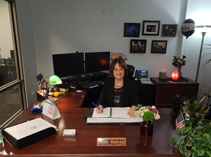 Supervisor of Elections Shirley Anderson works at her desk. [Credit: Austyn Szempruch]