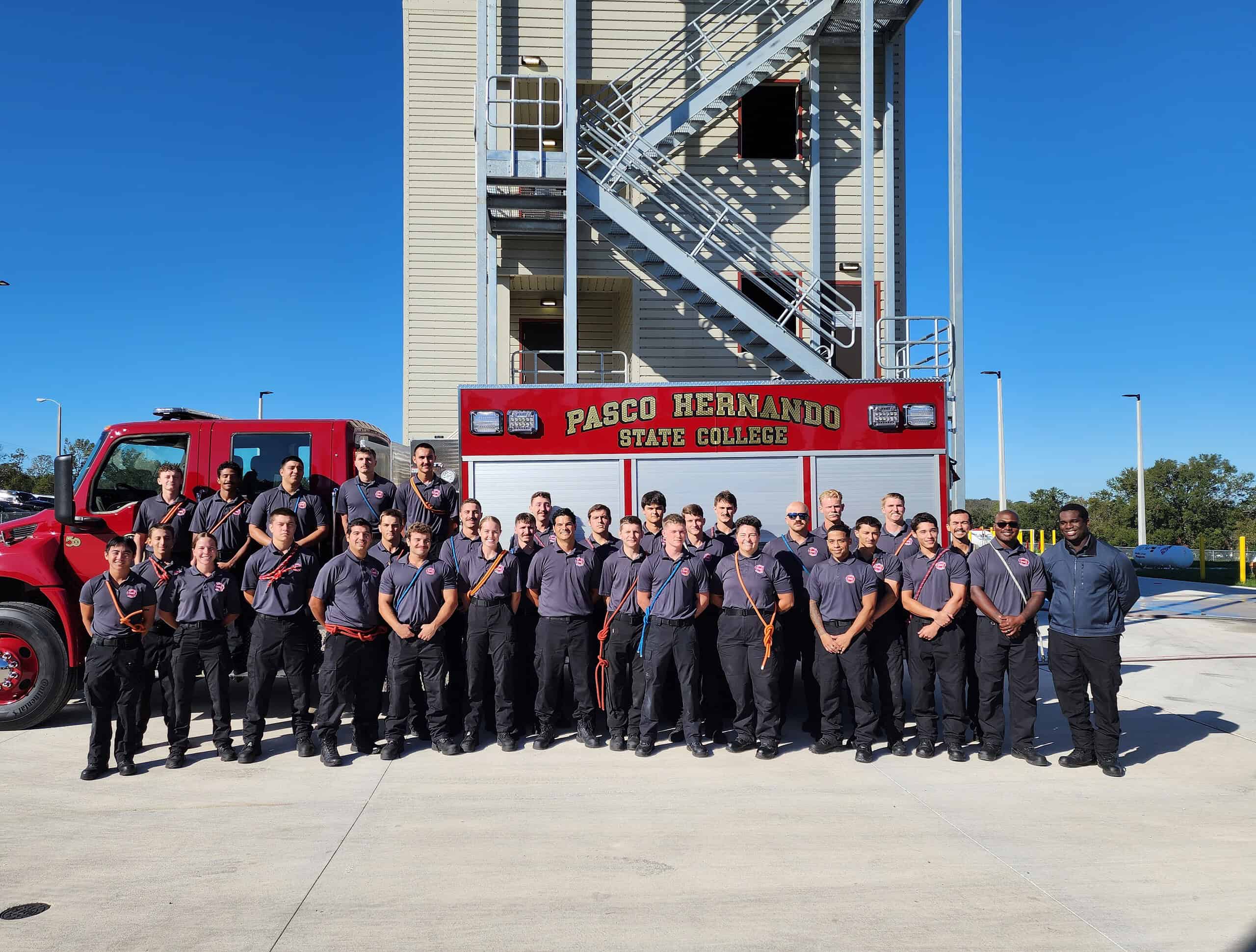 Cadets stand in front of the new Fire Training Station on Monday. [Credit: Austyn Szempruch]