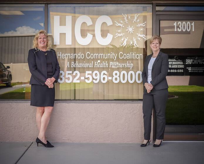 Tresa Watson, left, Executive Director of the Hernando Community Coalition with Jennifer Bliska, right, the Project Director, at the coalition's office located at 13001 Spring Hill Drive. [Photo by Sue Quigley]