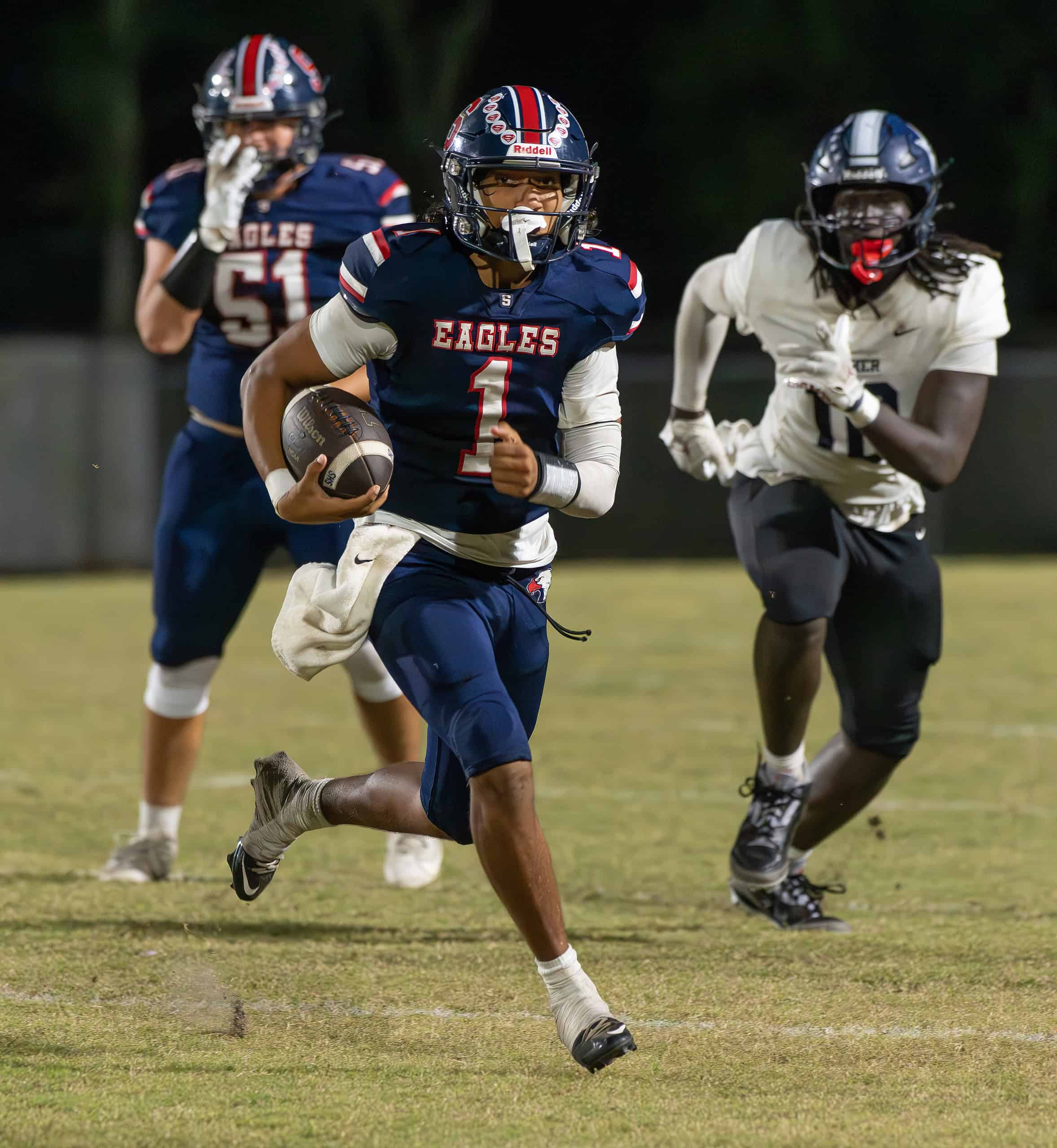 Springstead High, 1, Gio Martinez finds some running yardage in the game versus Gaither High Thursday at Booster Stadium.  [Photo by Joe DiCristofalo]