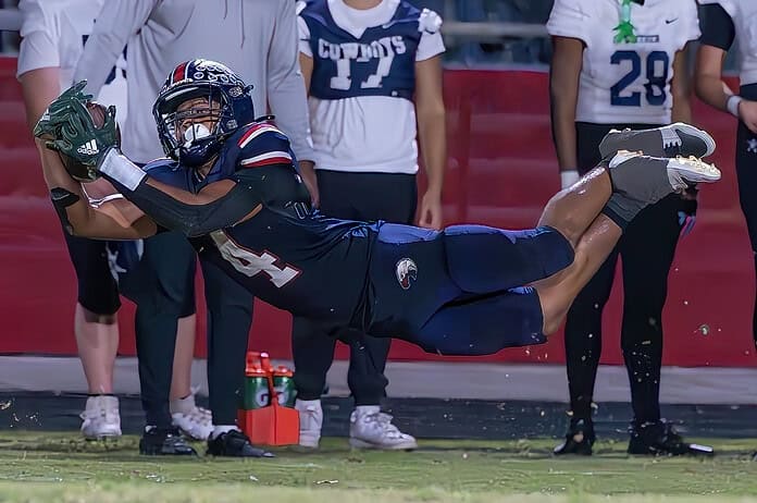 Springstead High, 4, Connor Mccazzio lays out for a catch attempt in the game versus Gaither High Thursday at Booster Stadium. The catch was ruled incomplete as he lost the ball with contact on the ground. [Photo by Joe DiCristofalo]