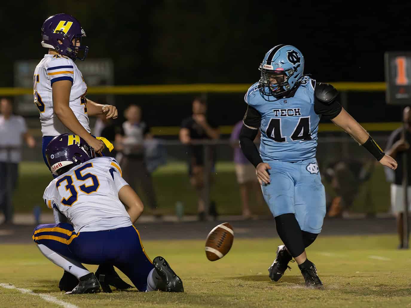 Nature Coast Tech, 44, Brayden Hogan blocked the extra point attempy by Hernando High's Dameon Lopez. [Photo by Joe DiCristofalo]