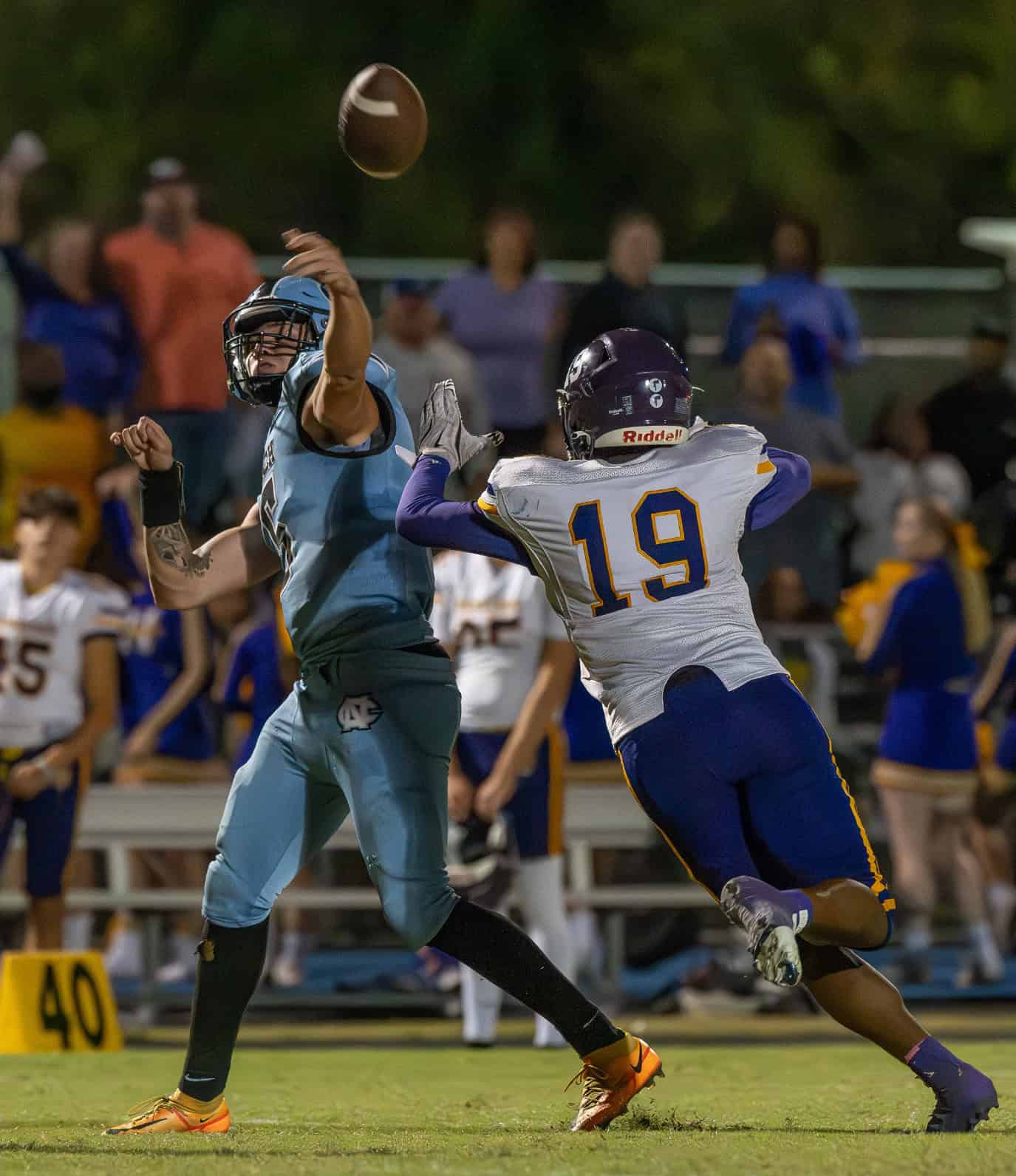 Pressure by Hernando High, 19, Caleb Williams disrupted the throw by Nature Coast Tech's QB Jackson Hoyt resulting in a red zone interception. [Photo by Joe DiCristofalo]