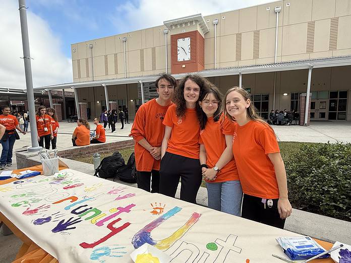 Students helping color in the 