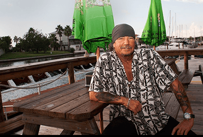 Mark Peloquin, owner and chef of the Tropical Grill Tiki Bar located at the Hernando Beach Marina. [Photo by Sue Quigley]