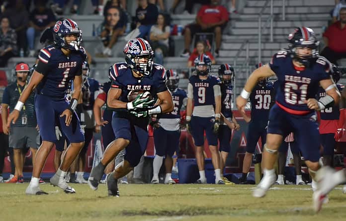 Connor McCazzio carries the ball for Springstead during Friday's game against visiting Lecanto. [Credit: Chris Bernhardt Jr.]