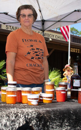 Juanita Sikes of the Florida Cracker Cattle and Florida Cracker Horse Associations sells her homemade canned goods at the Cowboy Festival November 16, 2024.