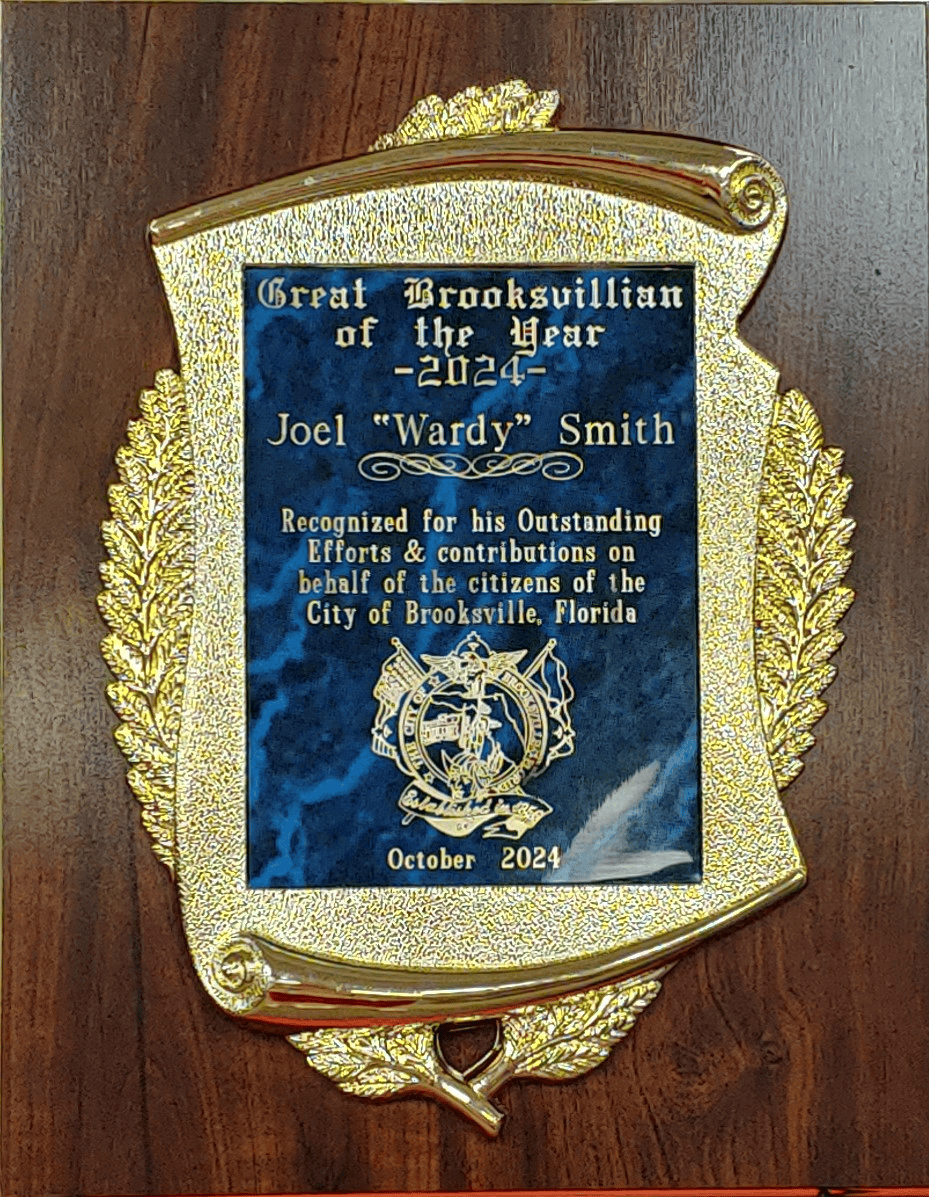 A plaque naming Joel "Wardy" Smith the Great Brooksvillian of the Year. [Credit: Sarah Nachin]