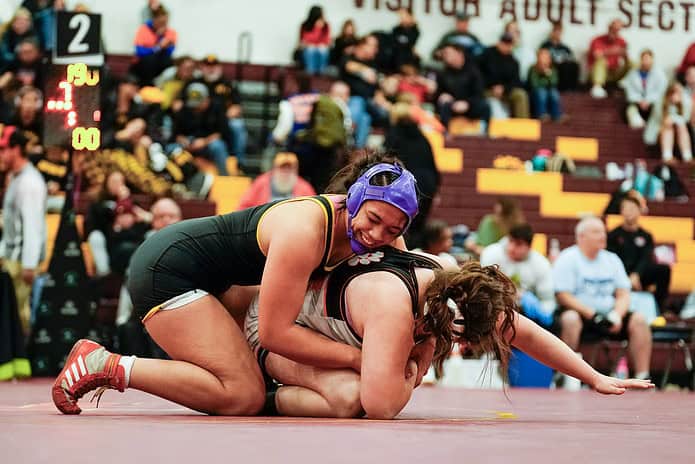 Hernando HIgh's Grace Leota (top) during the finals match of the 2024 Women of Ironman Wrestling Tournament in Ohio. [Credit: Jtak Shoots Sports Photography]