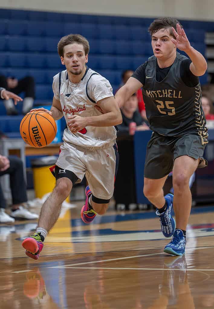 Springstead High's Ryan Sayre works the baseline in the game with visiting Mitchell High. [Photo by Joe DiCristofalo]