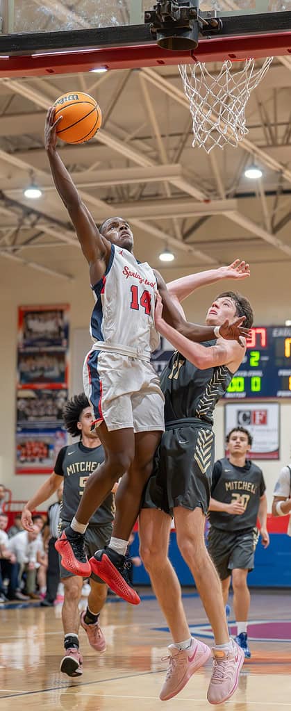 Springstead High's,14, Zion McKenzie looks for two points  in the game with visiting Mitchell High. [Photo by Joe DiCristofalo]