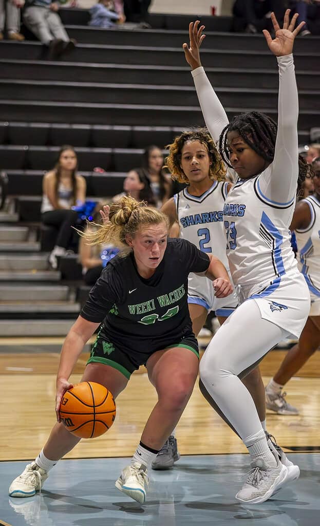 Karly Pasmore, 24, tries to get around NCT player Jaida Grier, 23, at Nature Coast Technical High School in Spring Hill, Fla., on Thursday, December 12, 2024.