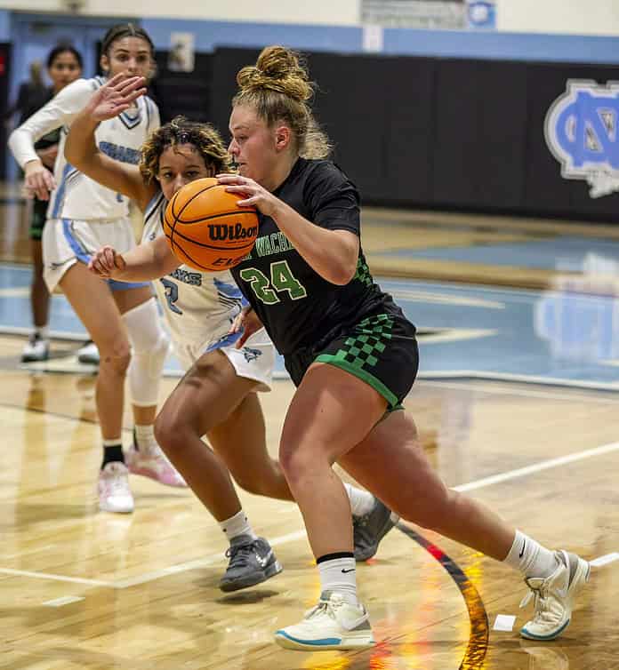 WWHS player Karly Pasmore, 24, drives the ball toward the basket at Nature Coast Technical High School in Spring Hill, Fla., on Thursday, December 12, 2024.