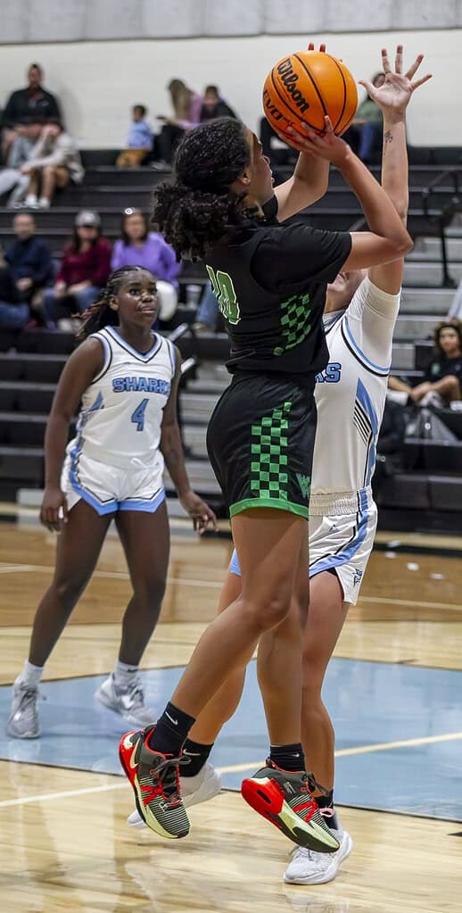 WWHS player Genesis Beal, 10, jumps to shoot the ball at Nature Coast Technical High School in Spring Hill, Fla., on Thursday, December 12, 2024.