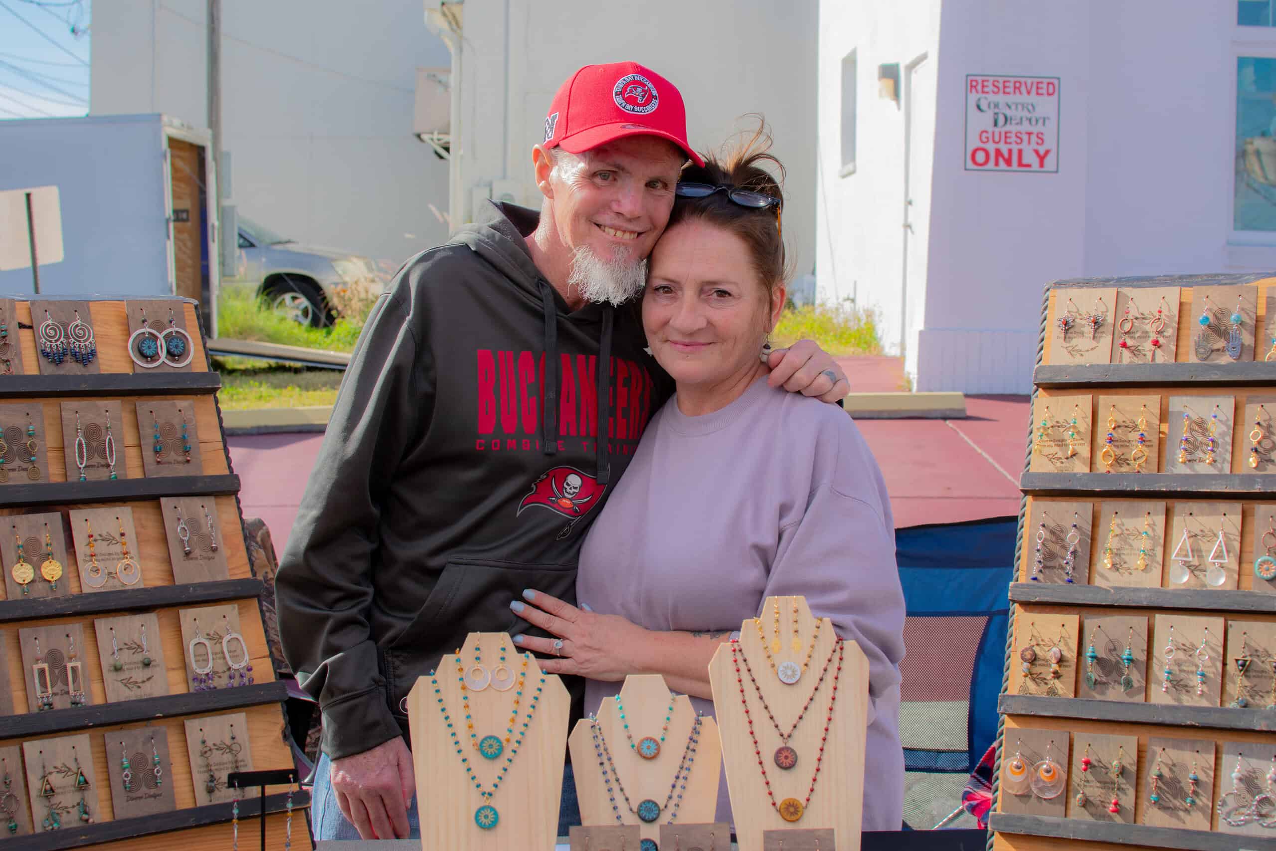 Jimmy and Dawn Peterson of Diverse Designs by Dawn at the Small Business Saturday outdoor market, November 30, 2024. [Credit: Jenifer Truitt]