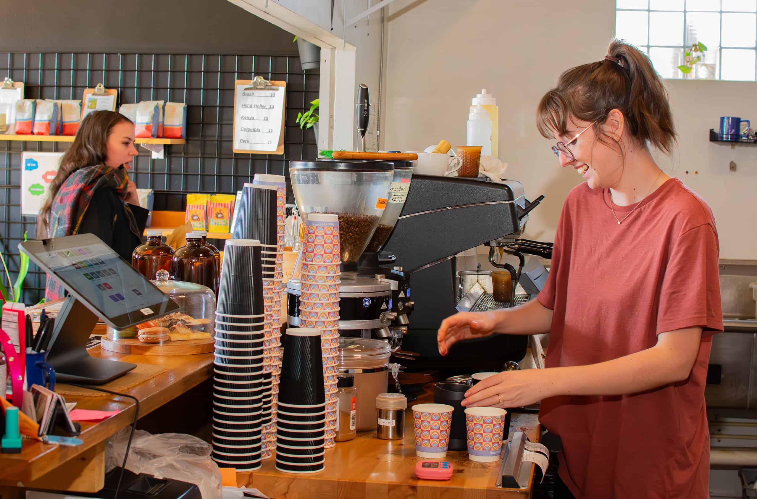 Barista Eleanor serves coffee at Mountaineer Coffee on Small Business on Saturday, November 30, 2024. [Credit: Jenifer Truitt] 