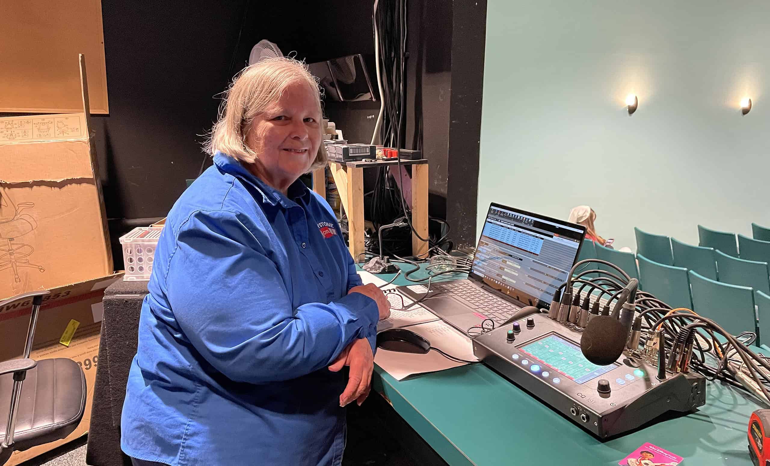 Dee Curran with her sound system (left) and her lighting board (right) [Photo by Sarah Nachin]