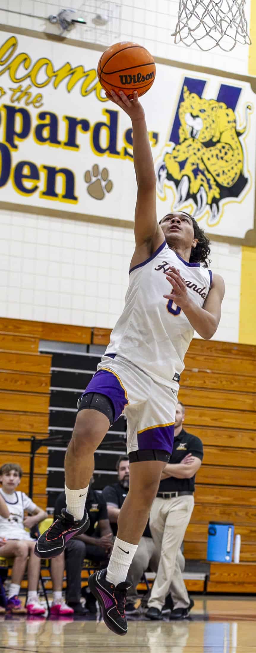 Hernando's Daniel Merizalde, 0, jumps to score a basket. (Photo by Hanna Maglio)