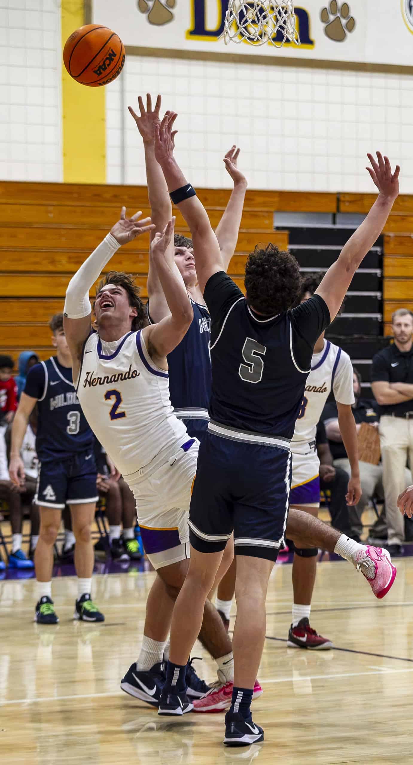 Hernando's Sam Jackson, 2, blocked from making a basket. (Photo by Hanna Maglio)