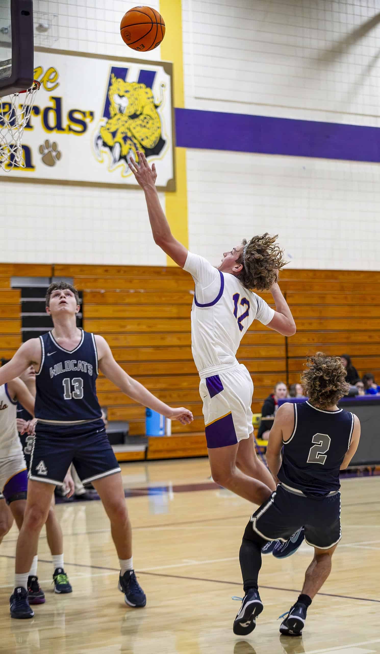 Hernando's Blake Williams leaps for a basket. (Photo by Hanna Maglio)