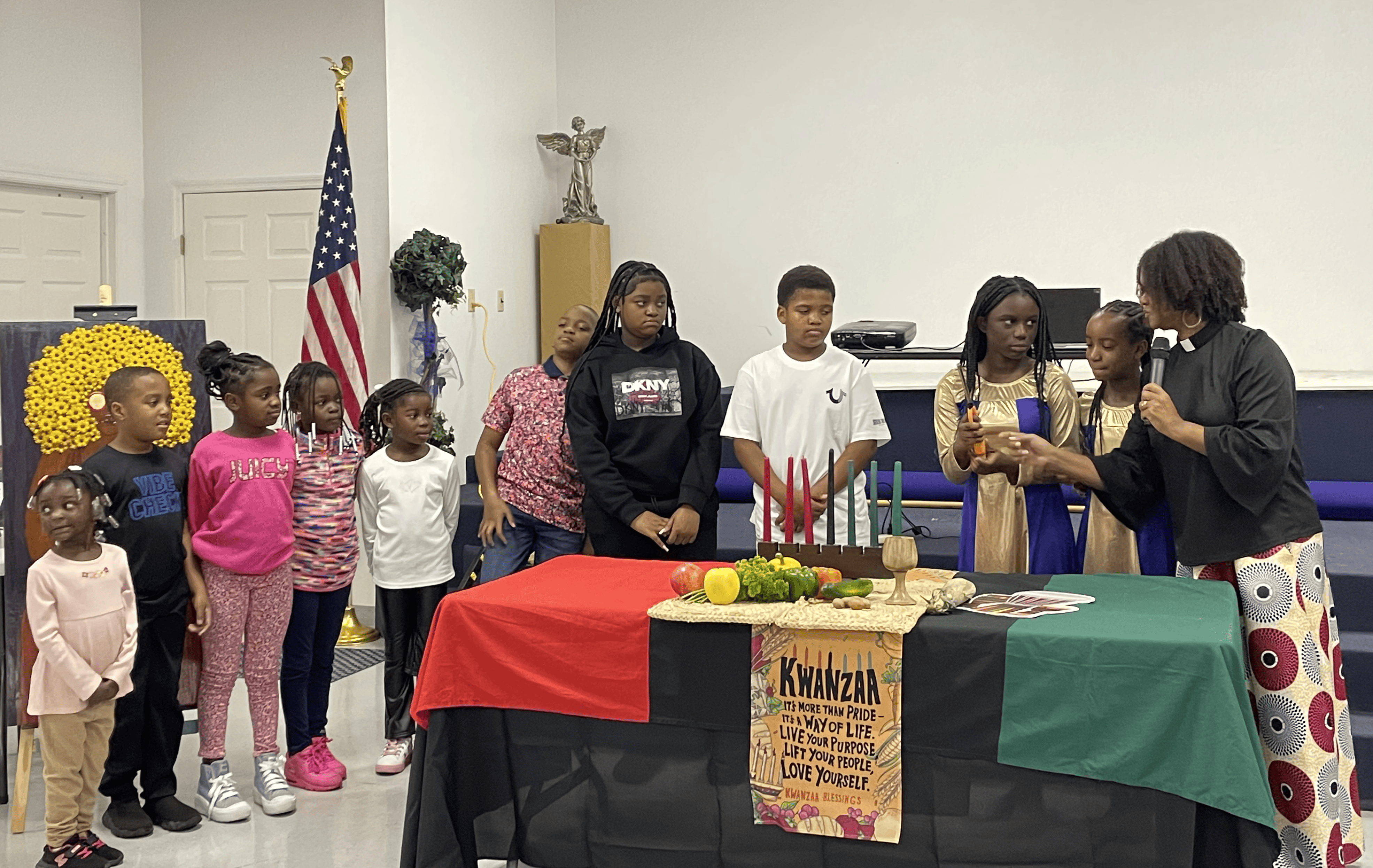 (L-R) Sole' Fogle, Marquon Hart, Cali Sanders, Kaileigha Jenkins, Lyric Jones, Victor Taylor, Zyneria Sanders, Bryson Sanders, Kabriah Batts, Samaj Holloway, and Pastor Nyika Taylor [Photo by Sarah Nachin]