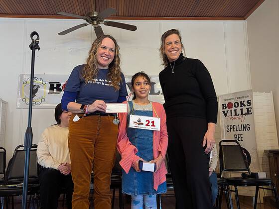 Booksville spelling bee winner Rayah Rodriguez, 3rd grade with Natalie Kahler (left) and Lara Dedmon (right).