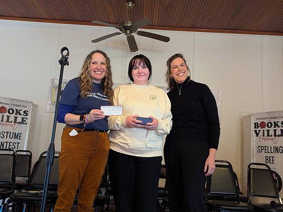 Booksville spelling bee winner Casey Connor, 9th grade with Natalie Kahler (left) and Lara Dedmon (right).