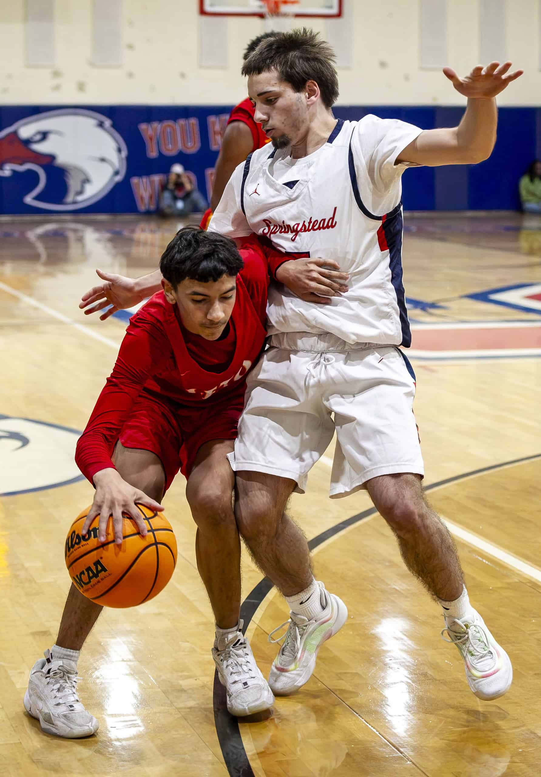 Springstead's Zion McKenzie, 14, leaps for a basket. (Photo by Hanna Maglio)