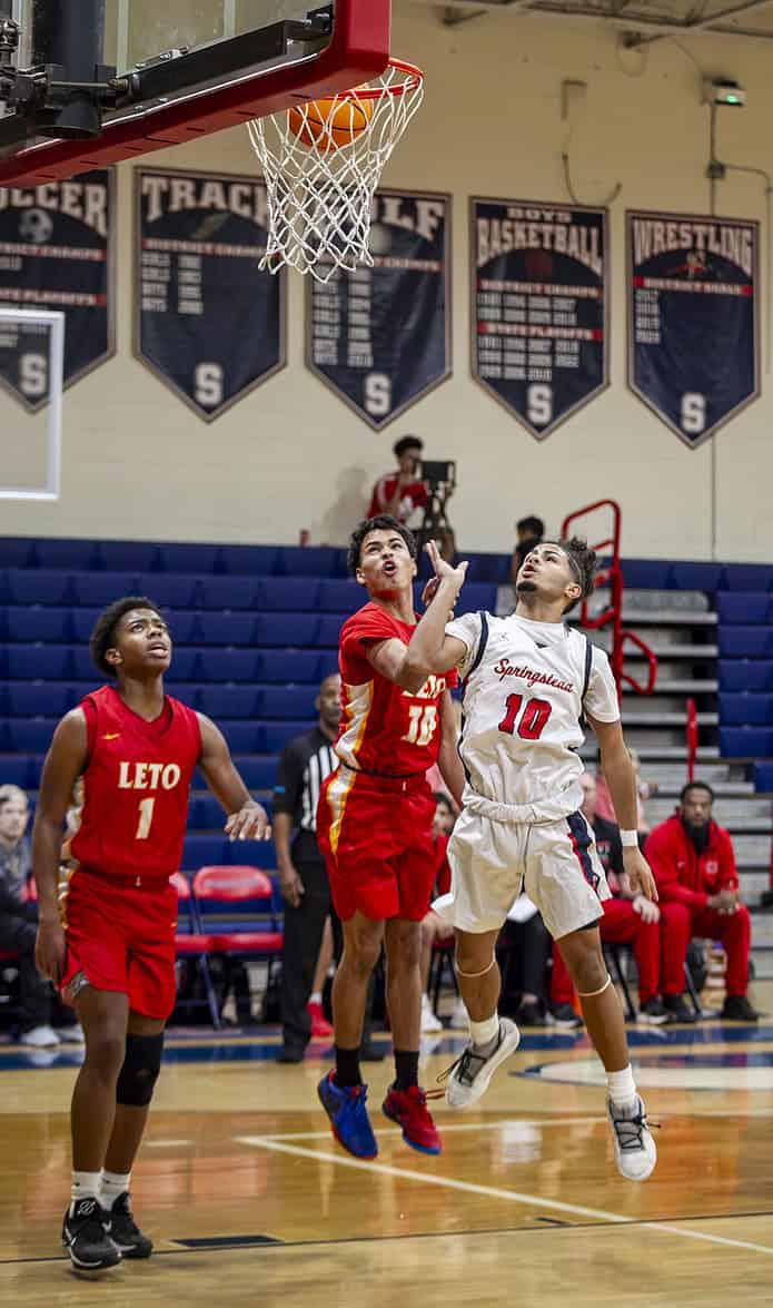 Springstead's Jamin Pond, 21, leaps for a basket. (Photo by Hanna Maglio)