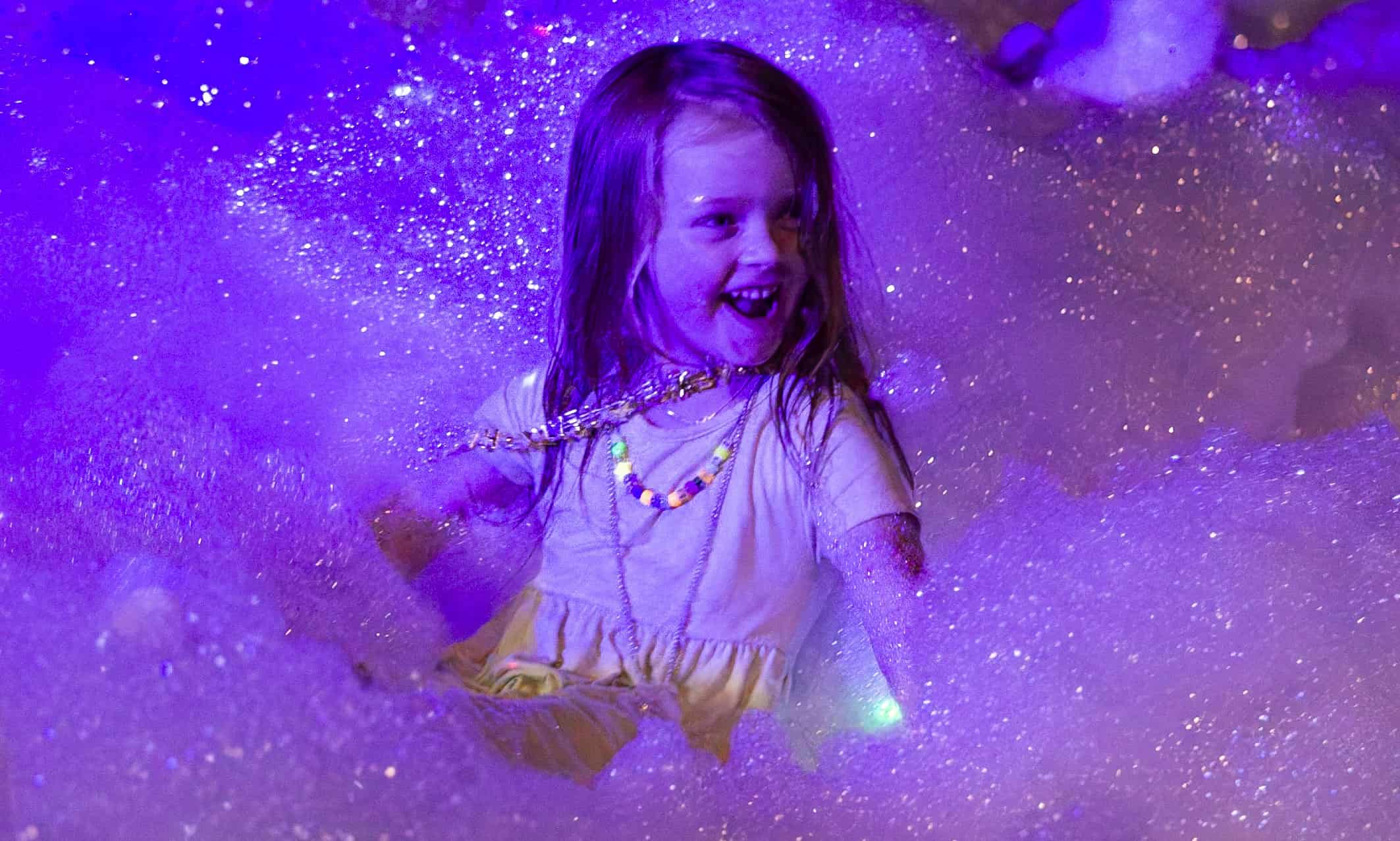 Playing in Bubbles n' Foam at the Tangerine Drop. [Photo credit Hanna Fox Maglio]