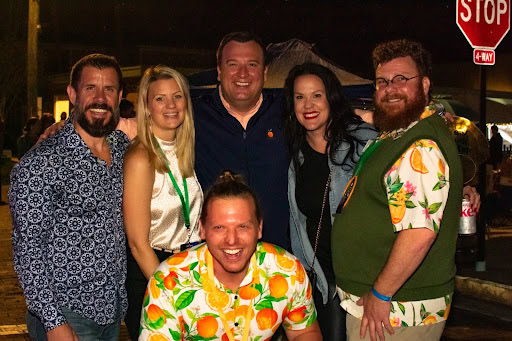 Supporters and directors of Brooksville Main Street gather for a photo at the Tangerine Drop December 31, 2024. From left to right: Justin and Lina Noe, Blake Bell, Mandi Dixon, Jimme Ray, and Bobby Read (in front).. [Photo credit Jenifer Truitt]