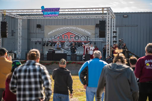 Leadfoot City’s grand opening was kicked off with the singing of the national anthem, a word from owner Achilles, and a visit from Mr. and Mrs. Claus on December 21, 2024. [Photo credit Jennifer Nott]