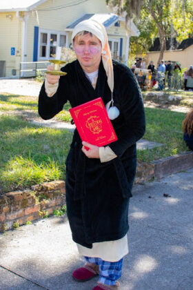 Booksville event volunteer Kevin Herbert poses in character as Ebenezer Scrooge during Booksville on January 25, 2025. [Photo by Jenifer Truitt]