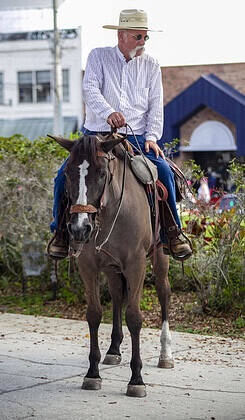 Joe Diez sauntered through the streets downtown on horseback [Photo by Hanna Fox Maglio]