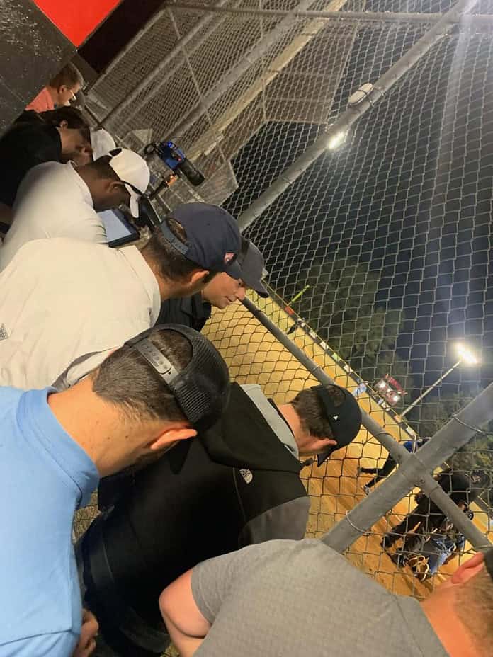 : Major League scouts watching Jackson Hoyt pitch during Monday night's preseason scrimmage against Newberry High in Dunellon. [Photo courtesy of Rich Hoyt.]