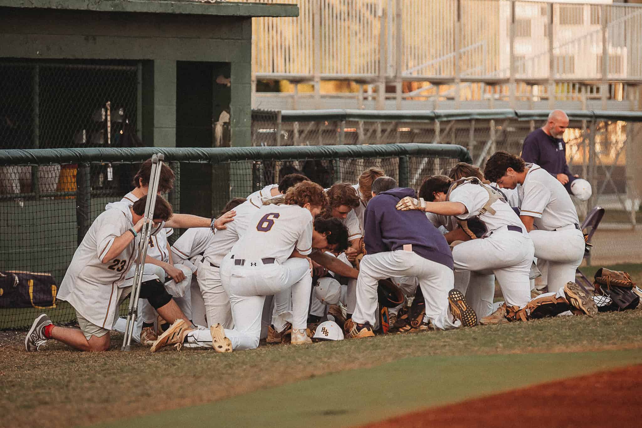 Hernando players and coaches huddle before game vs South Sumter. [Photo by Cynthia Leota]