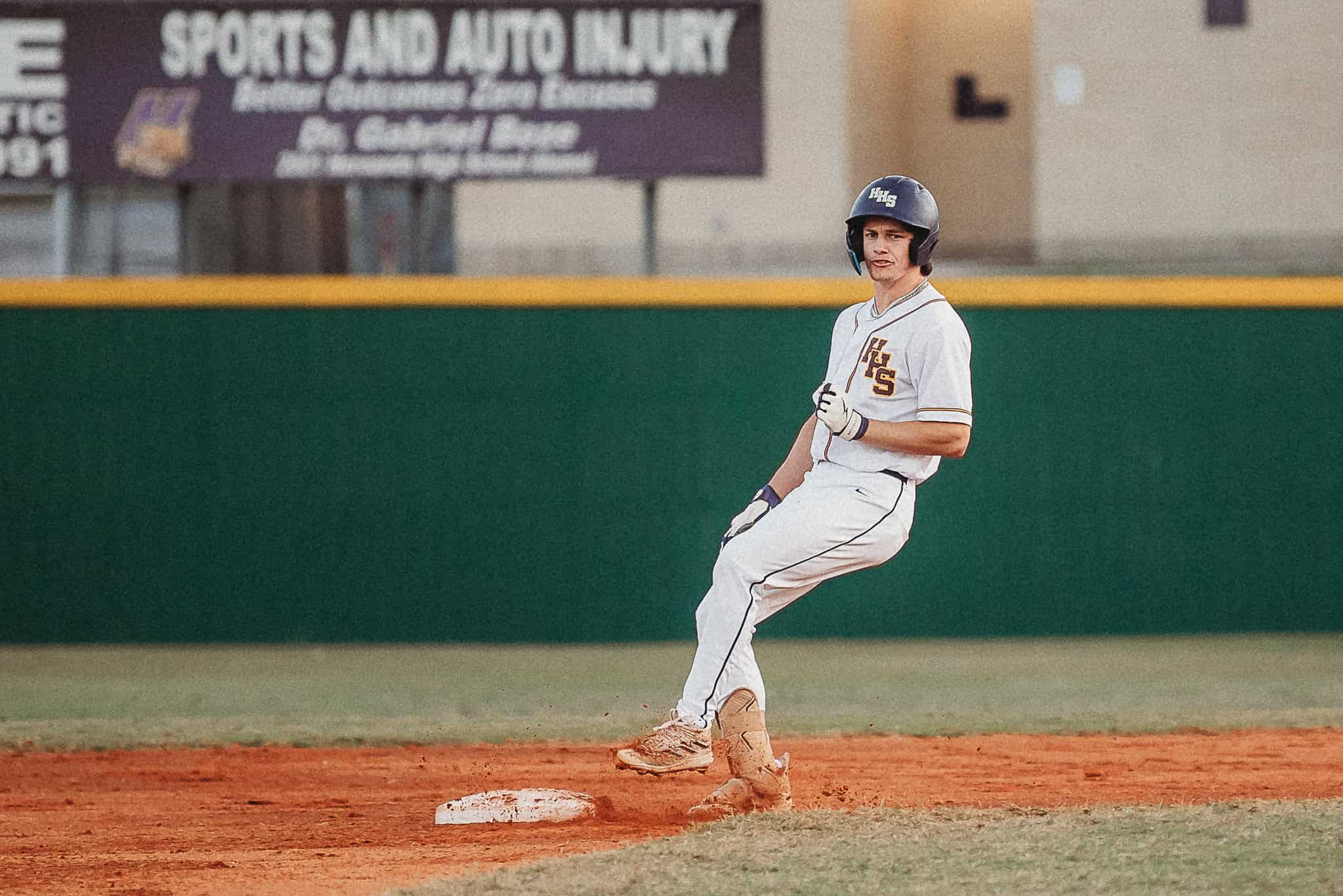 Hernando's Austin Knierim (JR) makes it to second base against South Sumter. [Photo by Cynthia Leota]