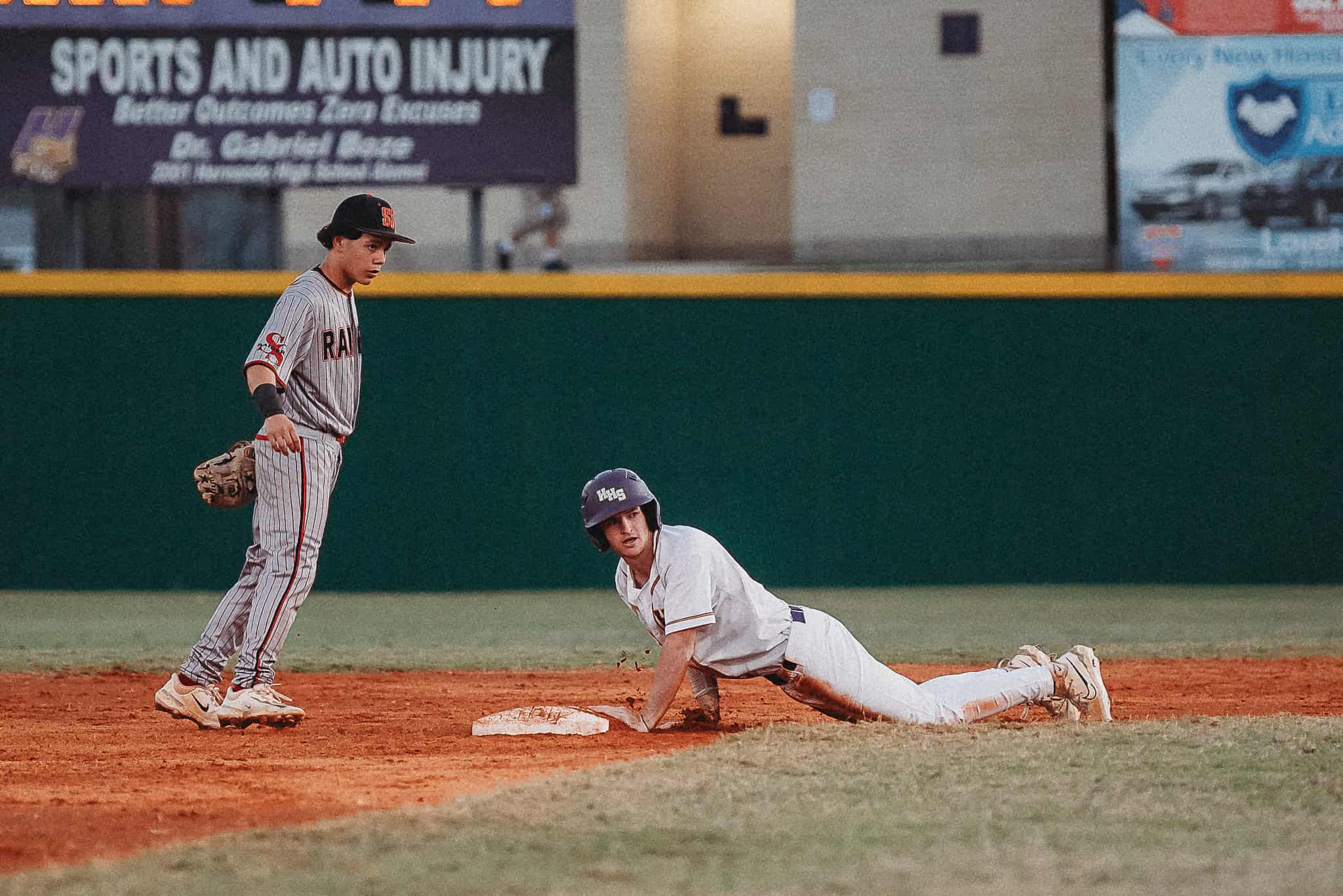 Hernando's Cody Whitelaw (SR) slides into second base at Friday night's home game vs South Sumter. [Photo by Cynthia Leota]