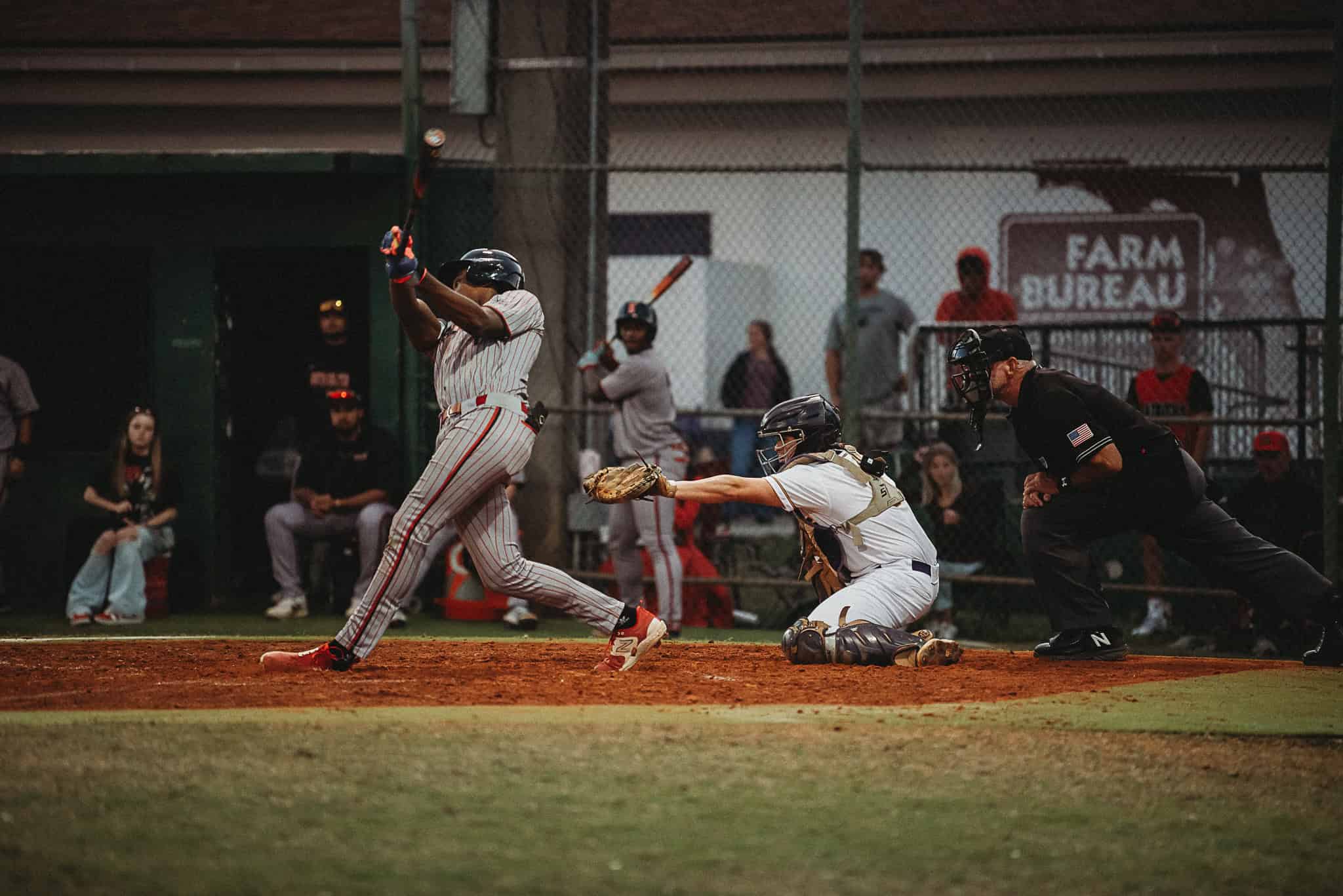 Leopard's Pitcher Cadyn Williams (JR) strikes out South Sumter player with Catcher Kaine Ellis (JR). [Photo by Cynthia Leota]