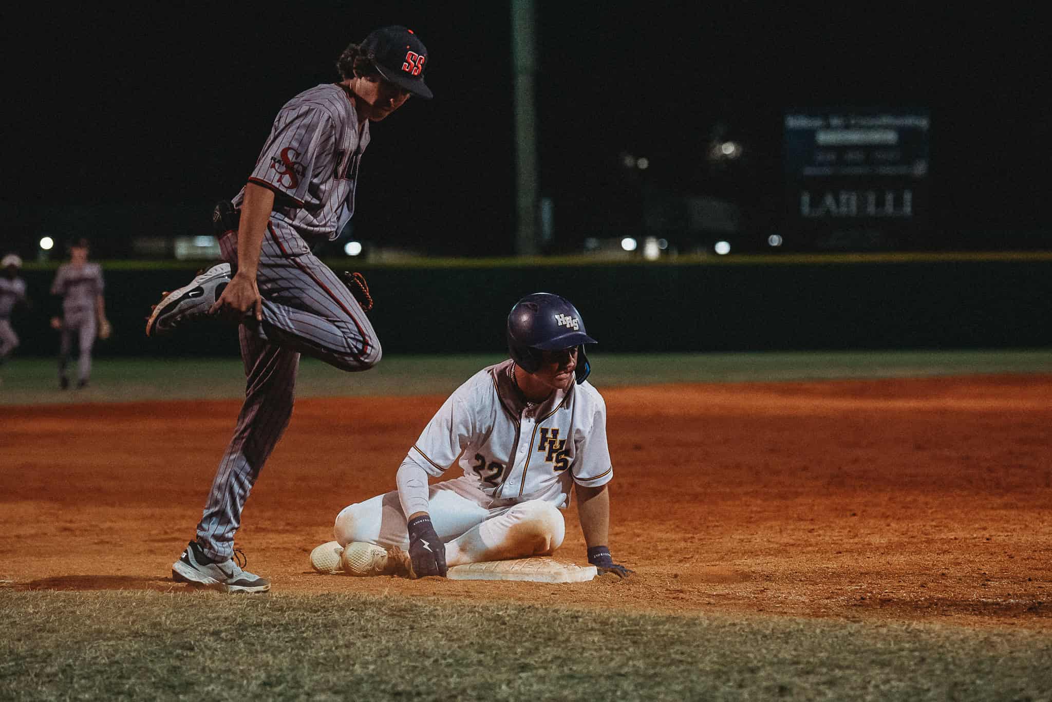 Hernando's Landon Euler slides into third base at Friday's home game vs South Sumter. [Cynthia Leota]