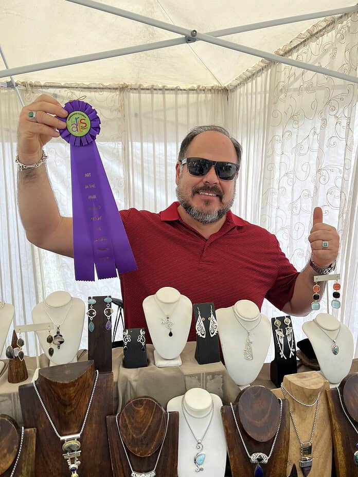 Fine Art Jewelry Artist and Best in Show Award Winner Juan Carlos Cahue from Ocala, FL [Photo by Paige McBride]