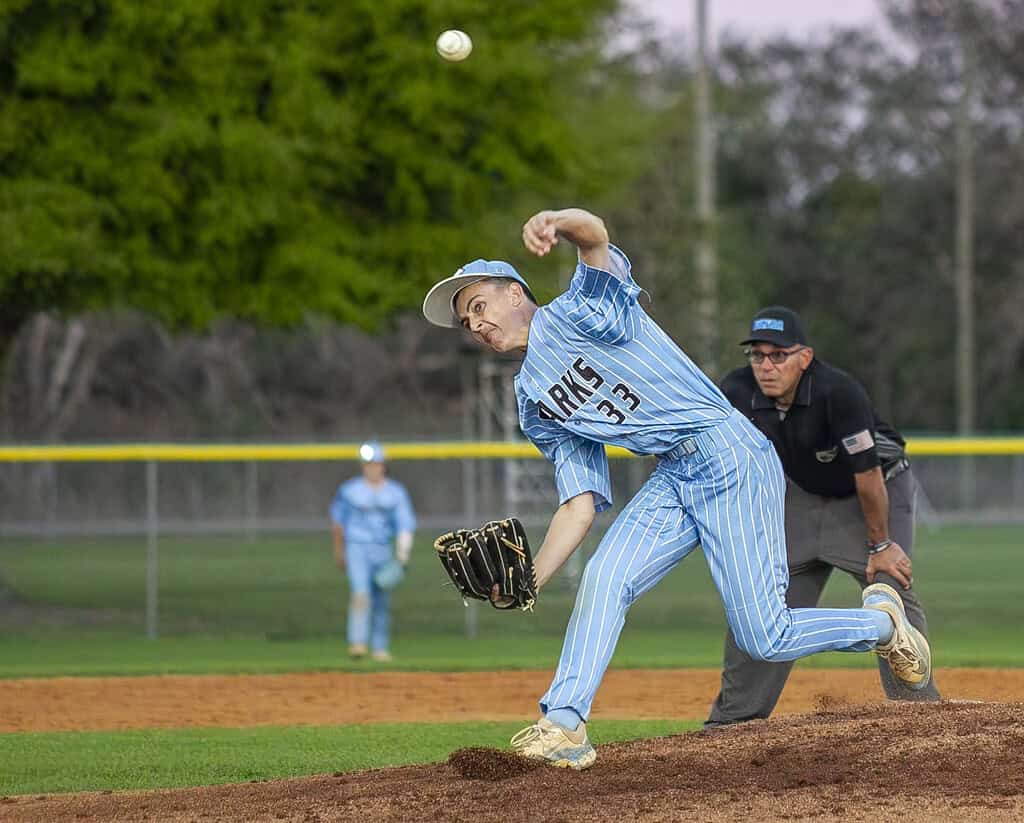 Mario Deangelis, 33, pitches the ball to the batter during a game at Nature Coast Technical High School in Brooksville, Fla., on Wednesday, March 19, 2025. (Photo by Hanna Maglio)