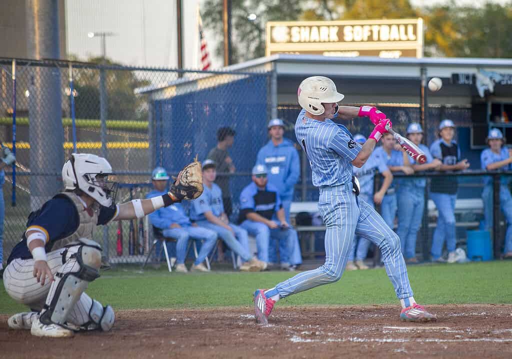 Cody Wright, 1, swings and connects with the ball during a game at Nature Coast Technical High School in Brooksville, Fla., on Wednesday, March 19, 2025. (Photo by Hanna Maglio)